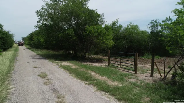 a view of backyard with green space
