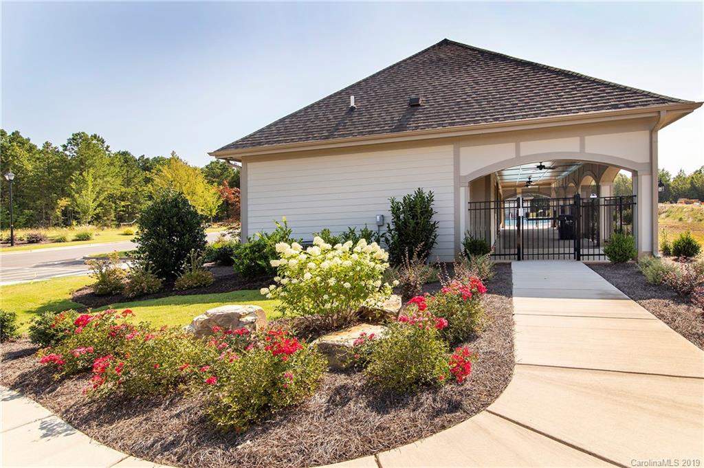 5505 Braddock Ml Way, Unit 273 Lancaster, SC 29720 - Photo 20 of 29 a front view of a house with a yard