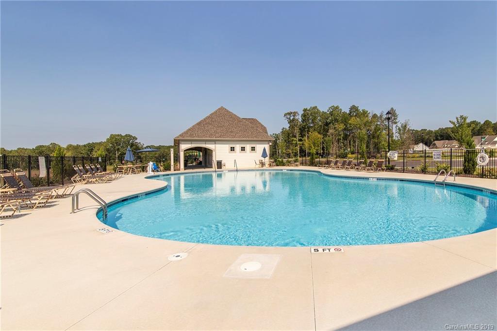 5505 Braddock Ml Way, Unit 273 Lancaster, SC 29720 - Photo 24 of 29 a view of a swimming pool with a yard