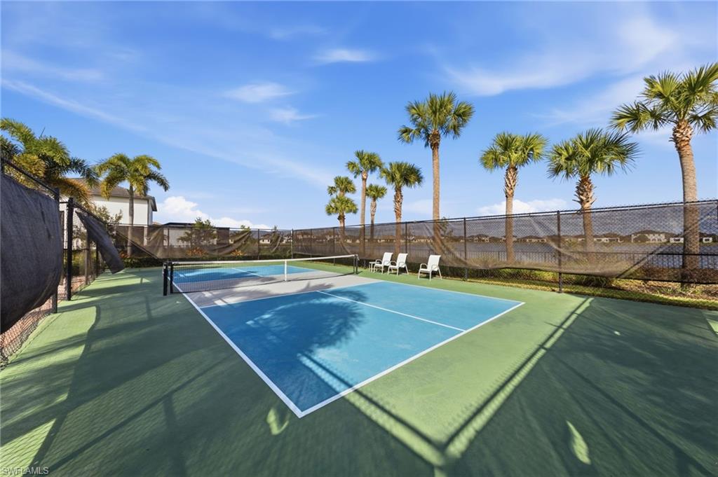 5172 Bergamo Way Ave Maria, FL 34142 - Photo 27 of 33 a view of a swimming pool with an outdoor seating