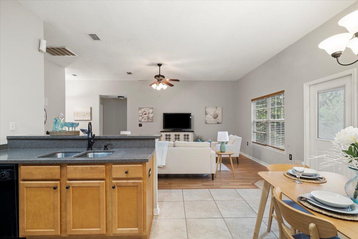 3140 Skyline Drive Crestview, FL 32539 - Photo 19 of 29 a living room with granite countertop furniture and a fireplace