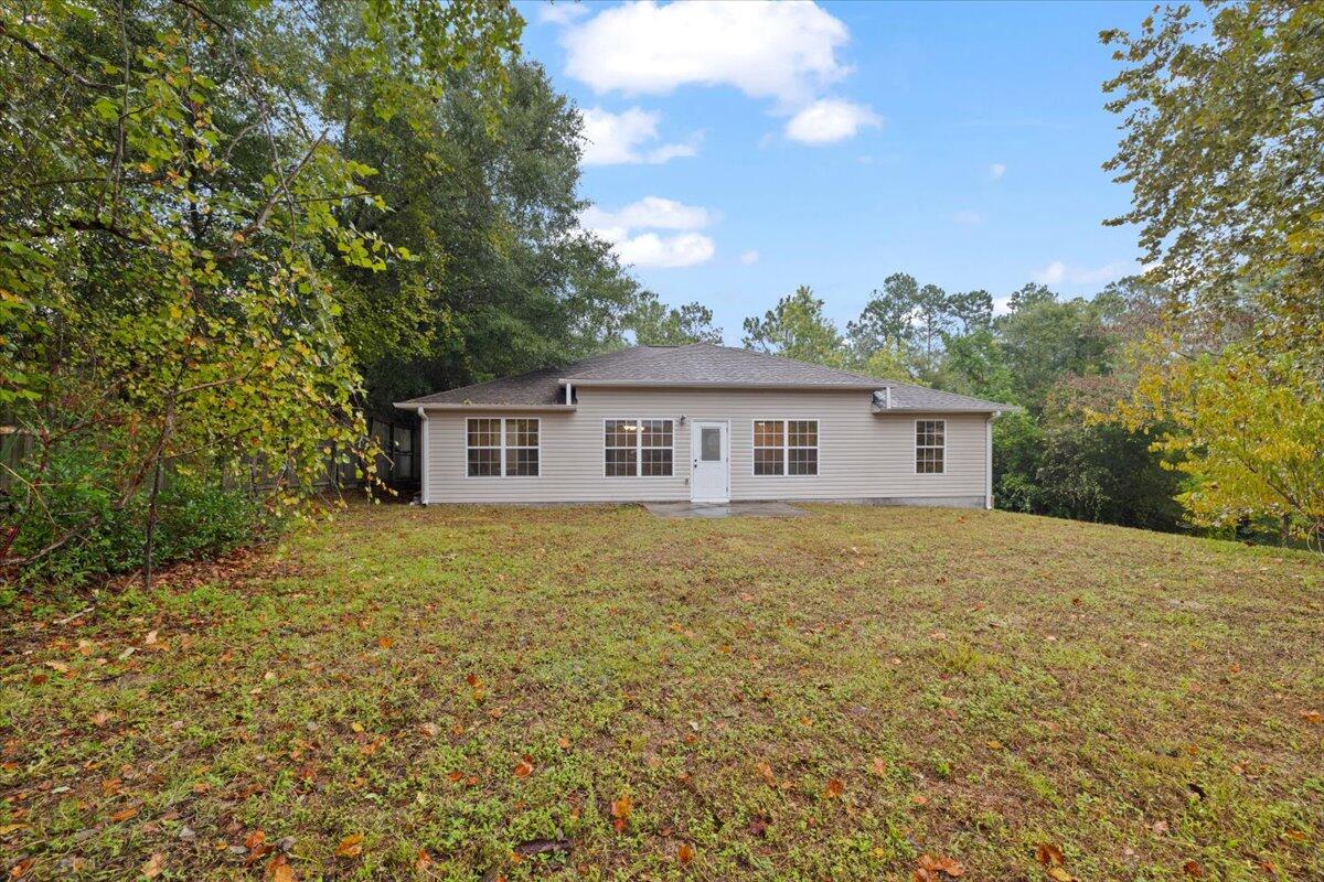 3140 Skyline Drive Crestview, FL 32539 - Photo 27 of 29 a view of house with outdoor space and garden
