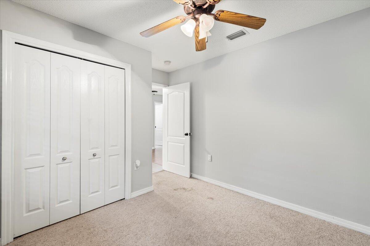 3140 Skyline Drive Crestview, FL 32539 - Photo 7 of 29 wooden floor in an empty room