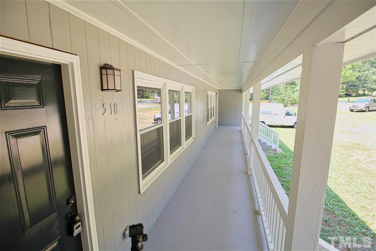 516 Dacian Road Raleigh, NC 27610 - Photo 2 of 16 a view of a hallway view with floor to ceiling window and entryway