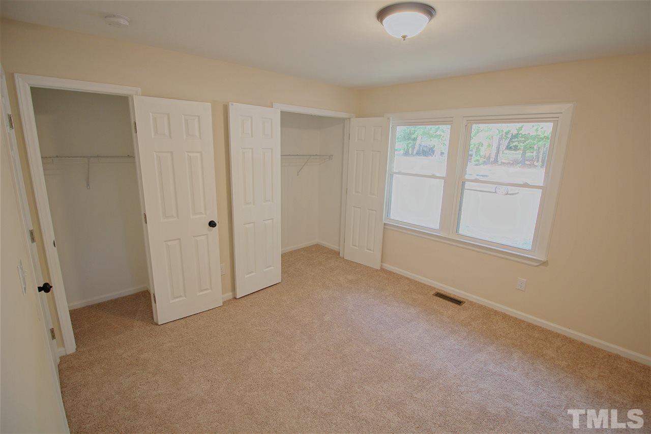 516 Dacian Road Raleigh, NC 27610 - Photo 12 of 16 a view of an empty room with a window