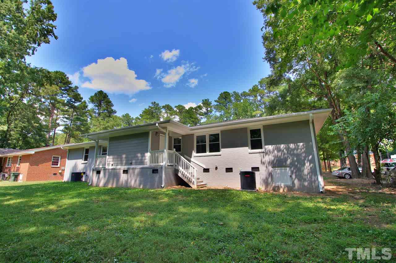 516 Dacian Road Raleigh, NC 27610 - Photo 16 of 16 a front view of house with yard and trees in the background