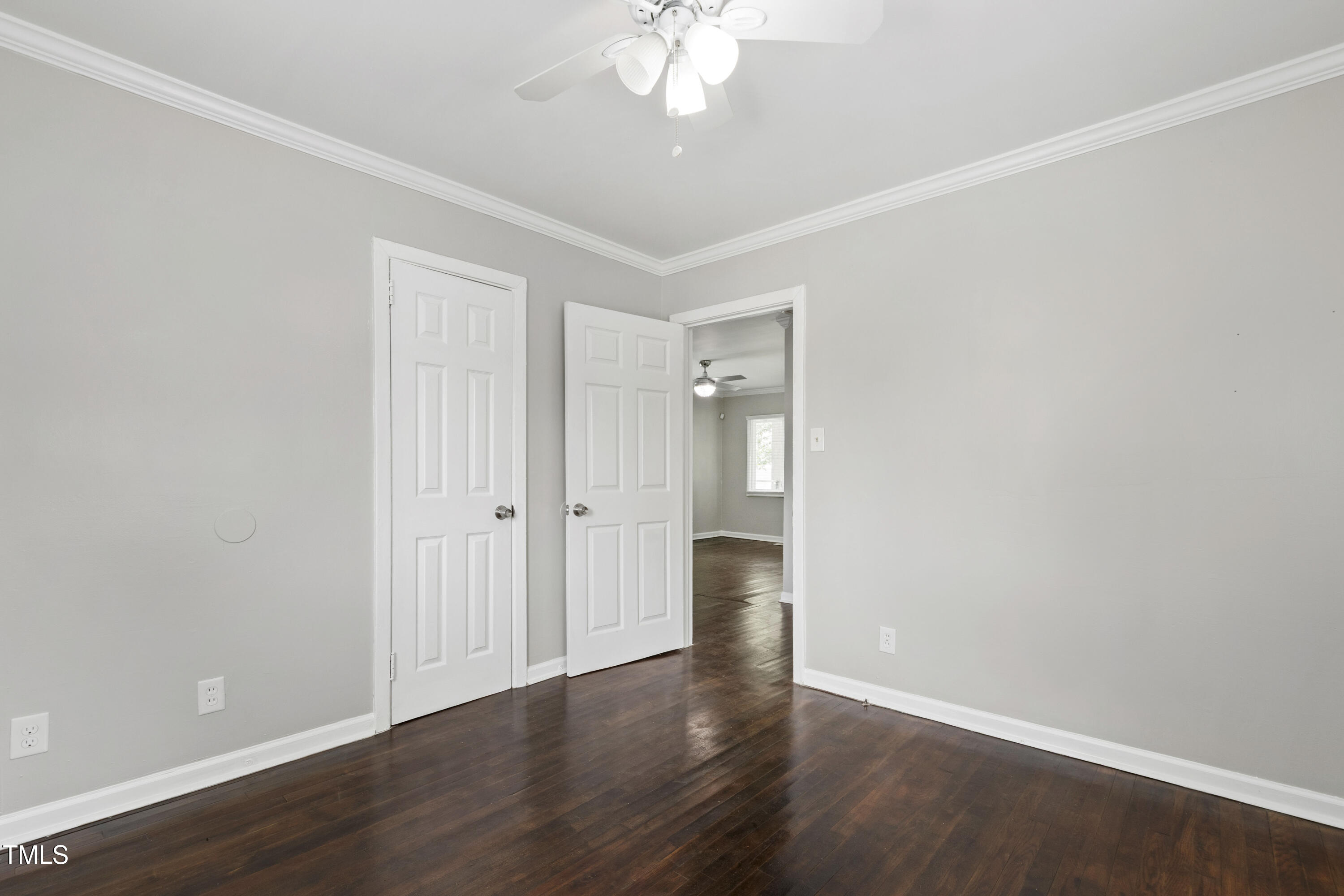 1220 Garner Road Raleigh, NC 27610 - Photo 12 of 26 a view of an empty room with wooden floor