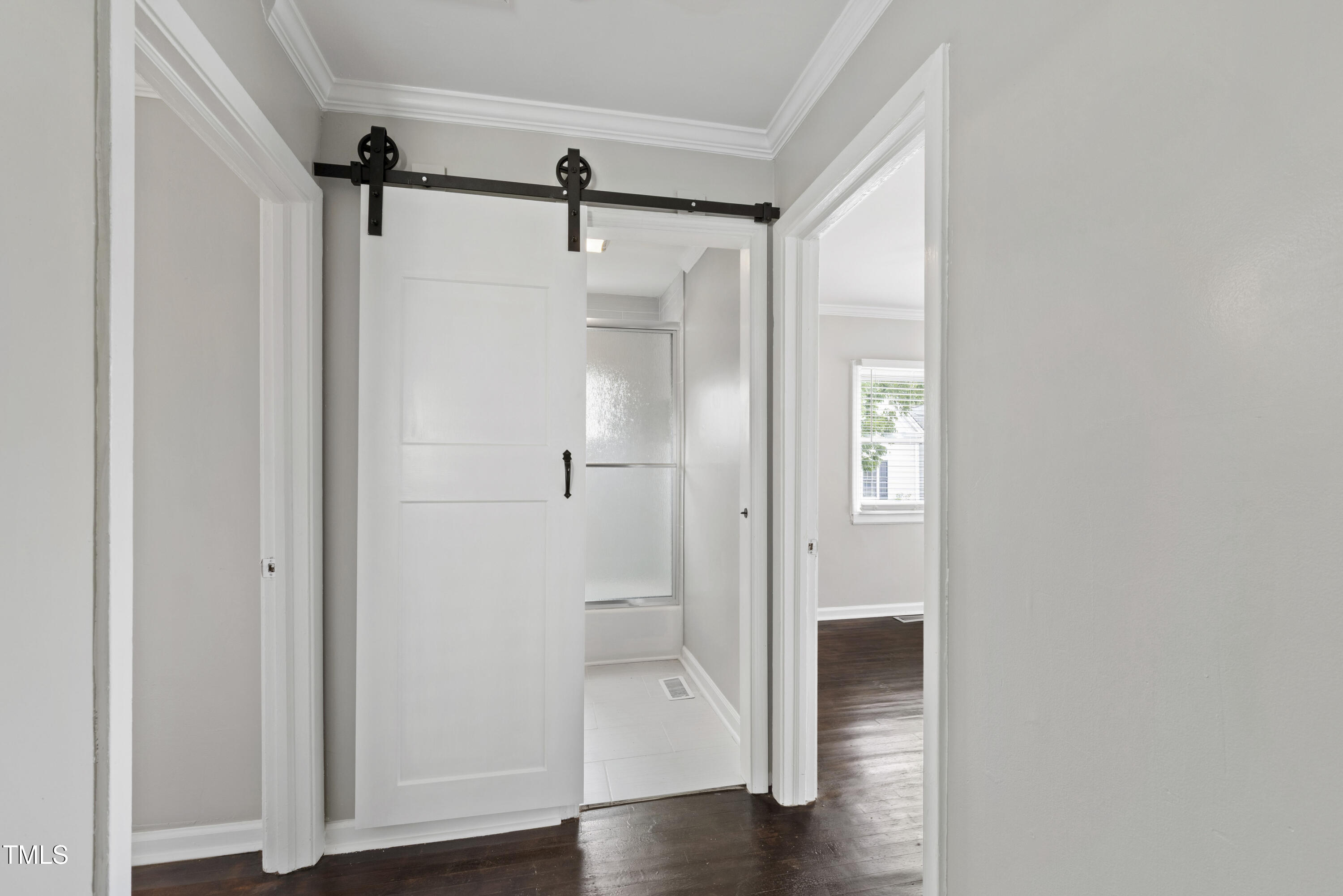 1220 Garner Road Raleigh, NC 27610 - Photo 14 of 26 a view of a hallway with wooden floor