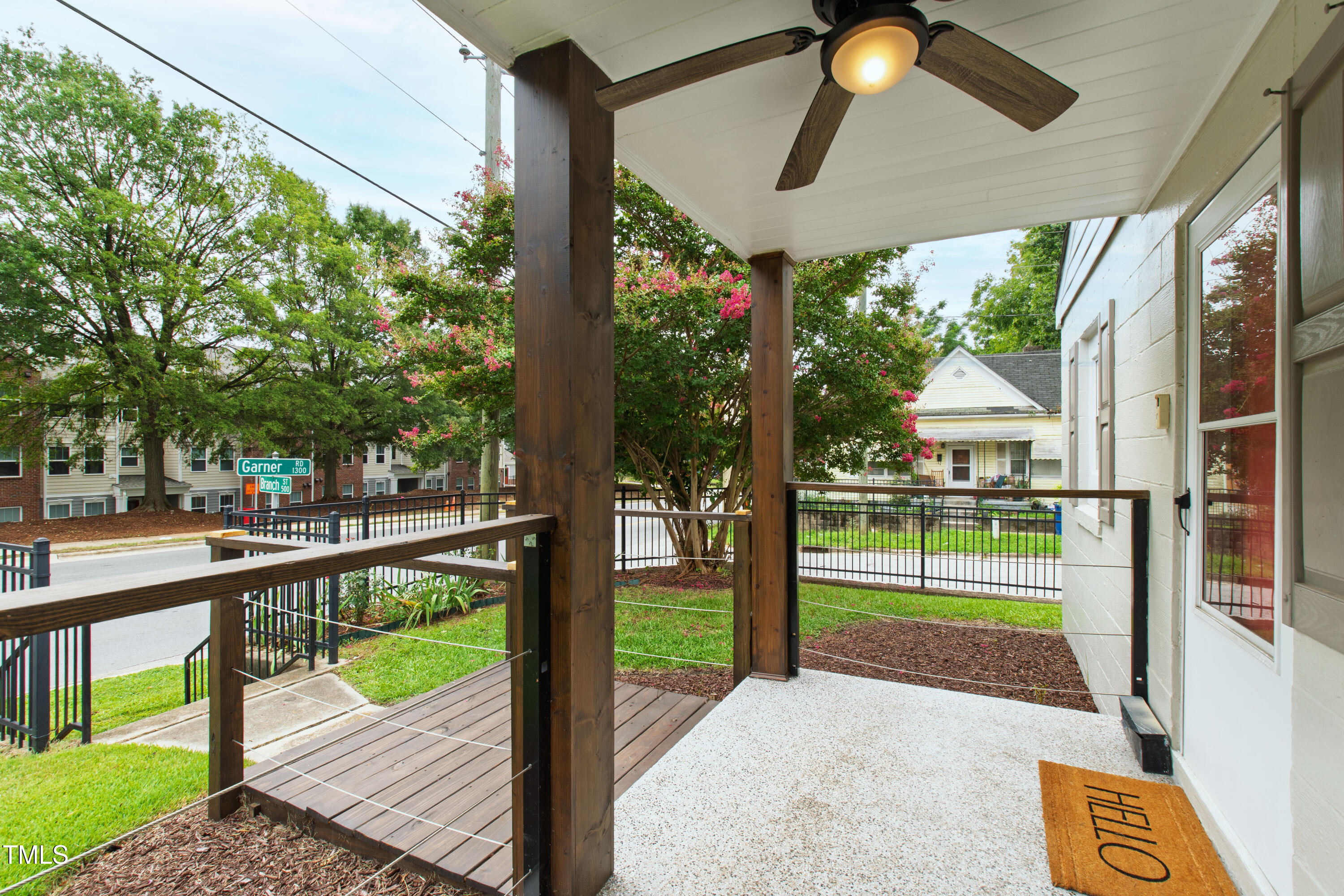 1220 Garner Road Raleigh, NC 27610 - Photo 24 of 26 a view of a porch and garden