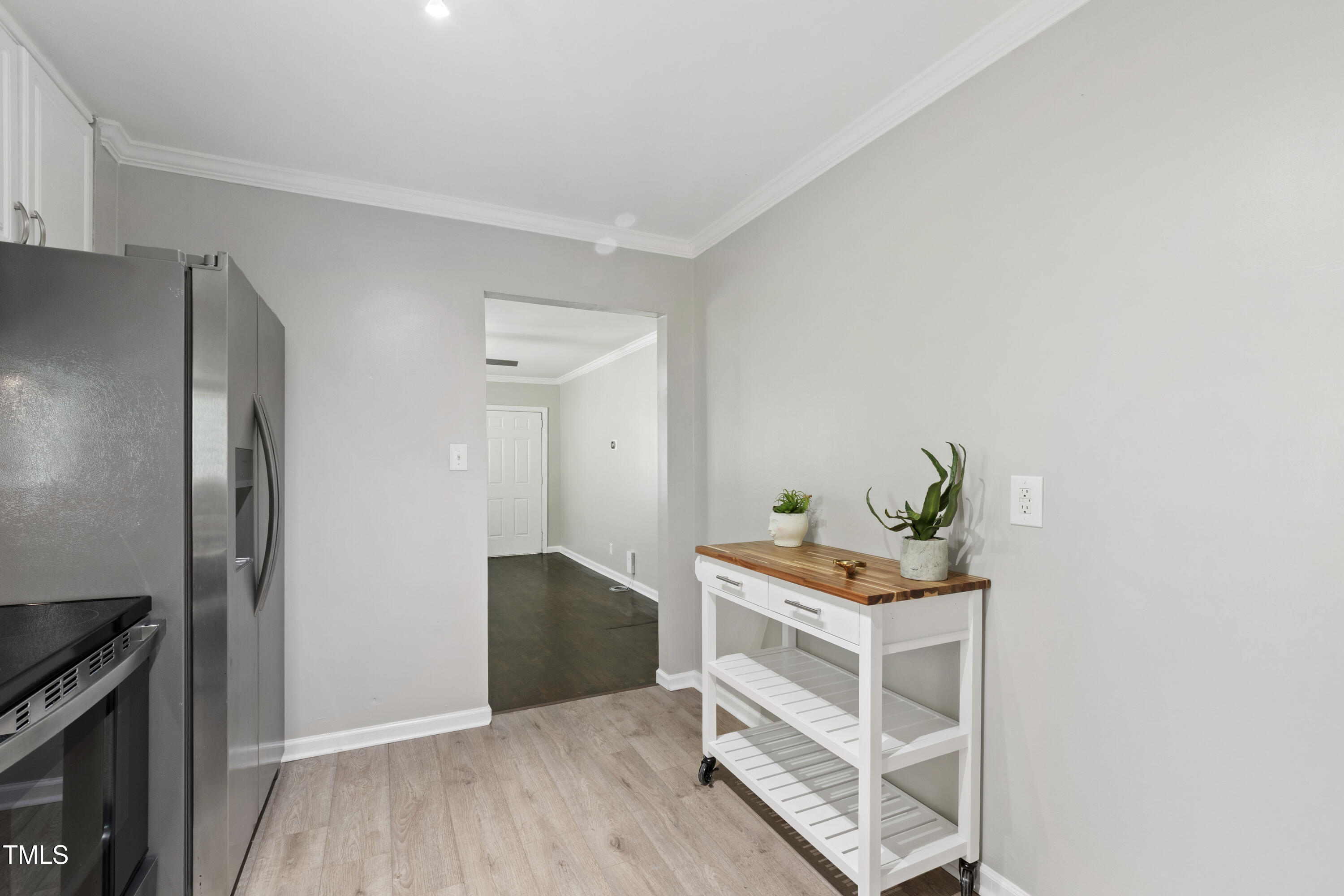 1220 Garner Road Raleigh, NC 27610 - Photo 6 of 26 a room with furniture and a window