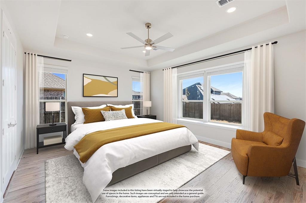 5622 Rowlan Row Midlothian, TX 76065 - Photo 18 of 39 a bedroom with a bed couch and a window