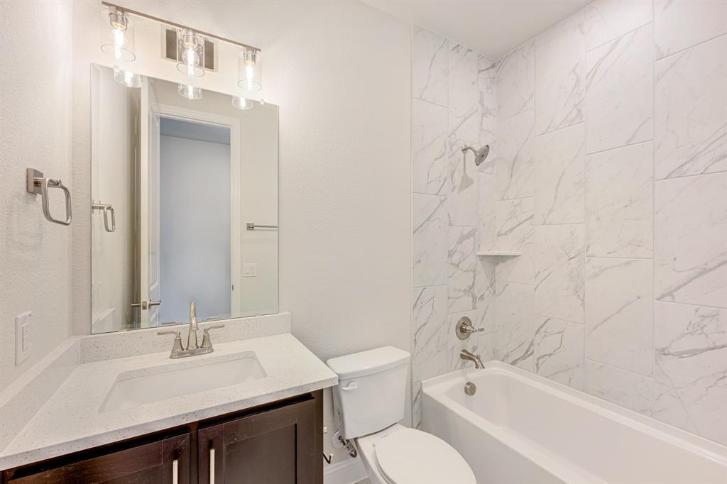 5622 Rowlan Row Midlothian, TX 76065 - Photo 23 of 39 a bathroom with a sink a toilet and shower