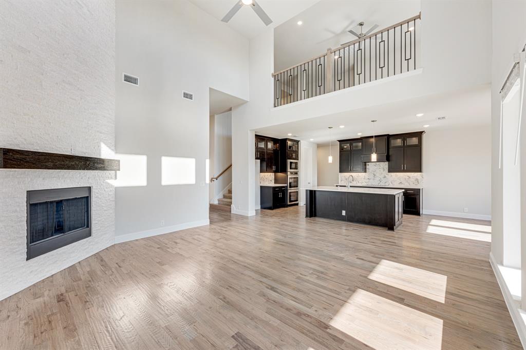 5622 Rowlan Row Midlothian, TX 76065 - Photo 10 of 39 a view of kitchen with microwave and cabinets