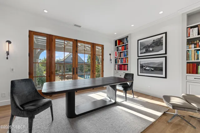 a room with furniture and a large window