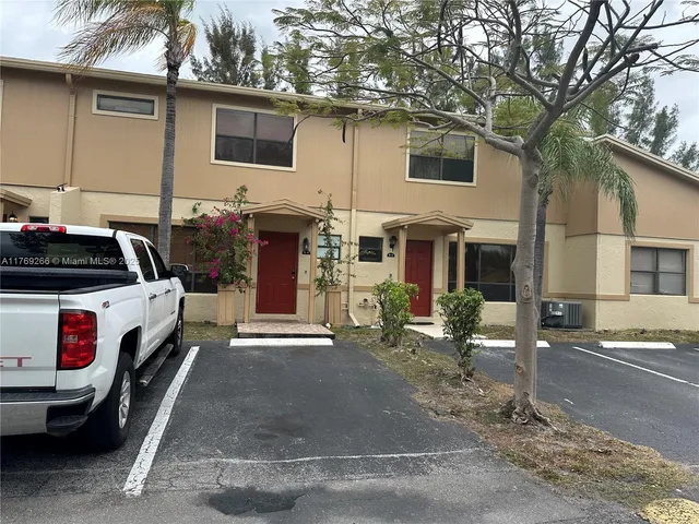 a car parked in front of a house