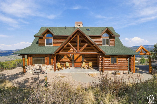 1701 Oak Road Coalville, UT 84017 - Photo 2 of 71 Log cabin exterior with a prominent A-frame entry