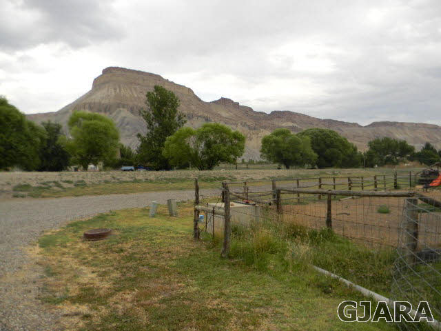 3455 G Road Clifton, CO 81520 - Photo 3 of 28 a view of a lake with mountains in the background