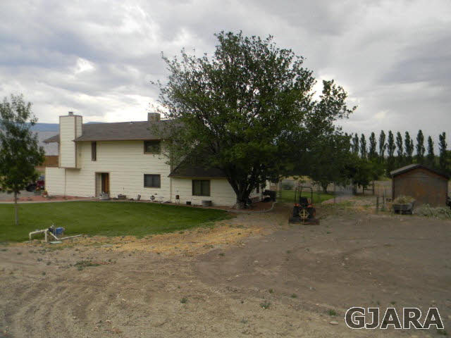 3455 G Road Clifton, CO 81520 - Photo 7 of 28 a view of a house with a patio