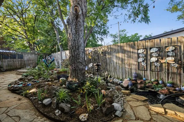 a backyard of a house with lots of green space