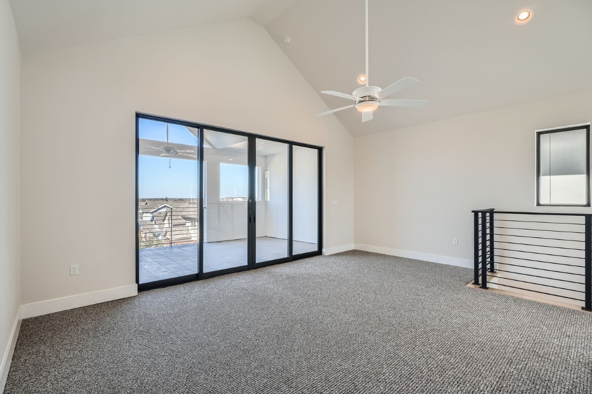 9033 Cattle Baron Path Austin, TX 78747 - Photo 22 of 28 an empty room with windows and fan