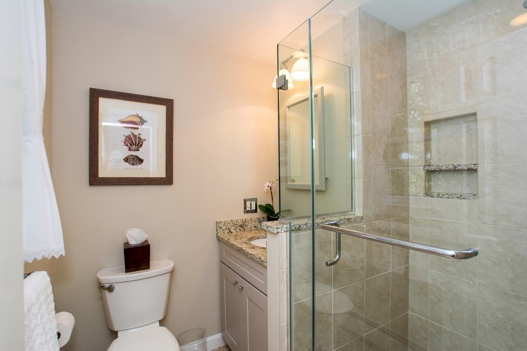 21 Lee Road Medfield, MA 02052 - Photo 16 of 30 a bathroom with a toilet sink and shower