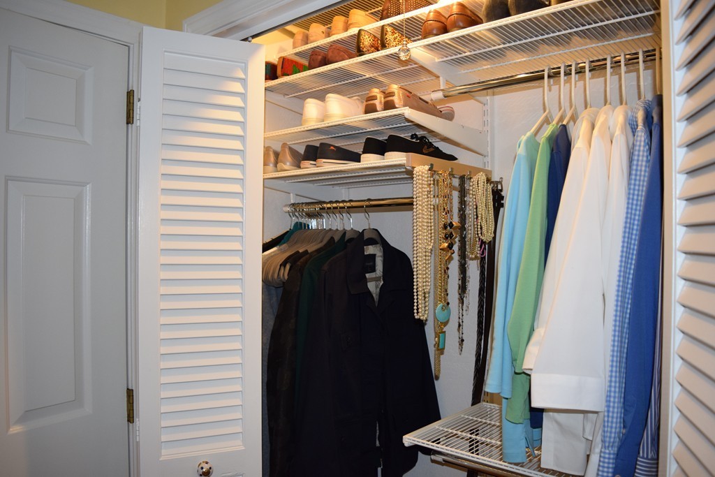 21 Lee Road Medfield, MA 02052 - Photo 17 of 30 a view of walk in closet with clothes and shoes