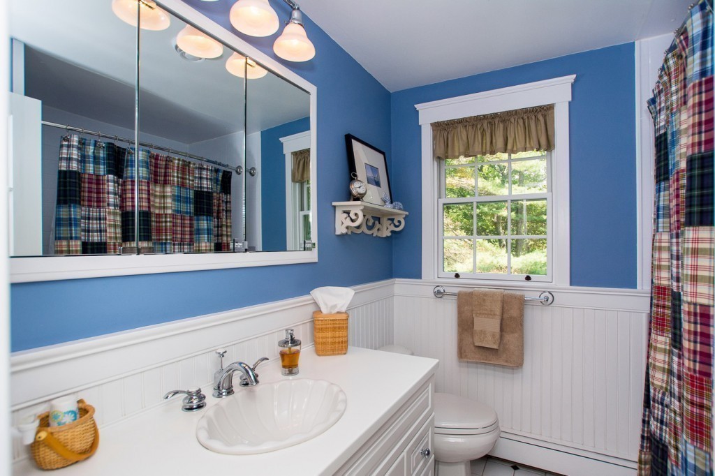 21 Lee Road Medfield, MA 02052 - Photo 20 of 30 a bathroom with a sink and a mirror