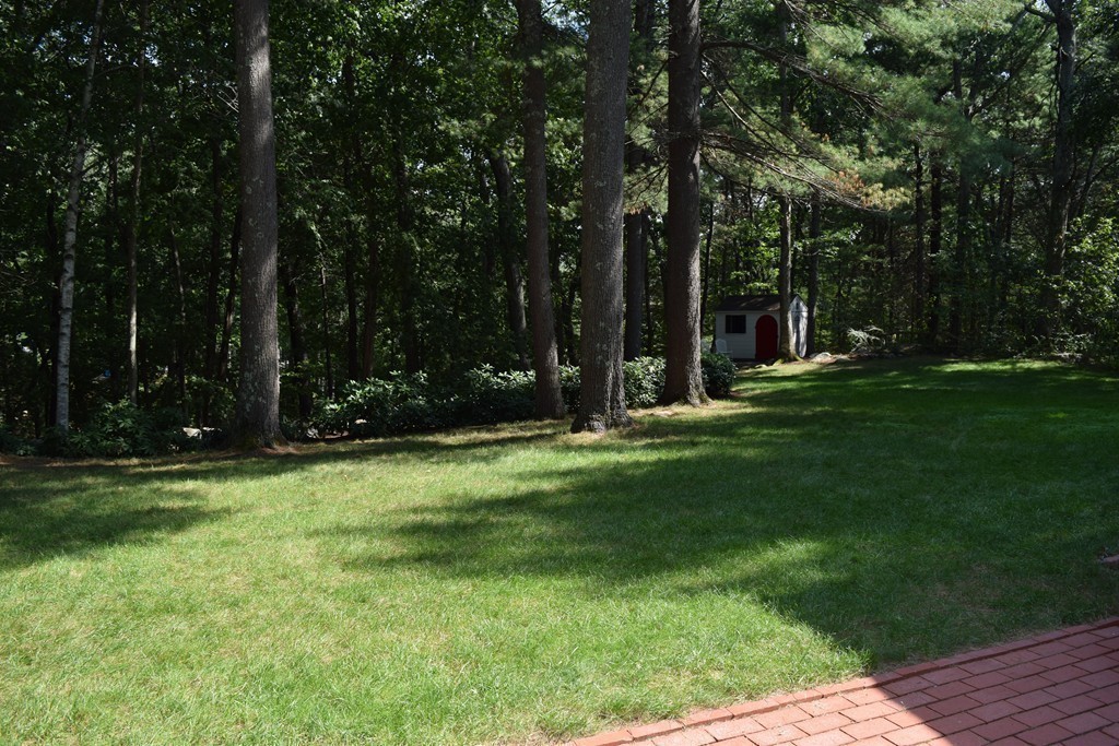 21 Lee Road Medfield, MA 02052 - Photo 27 of 30 a view of field with trees in the background