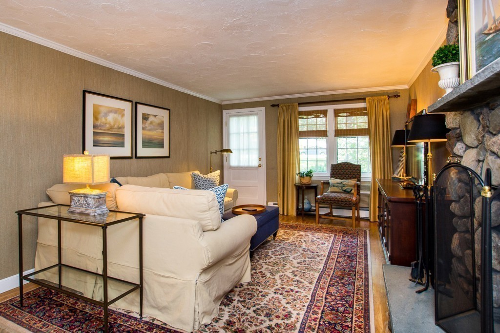 21 Lee Road Medfield, MA 02052 - Photo 8 of 30 a living room with furniture a fireplace and a window