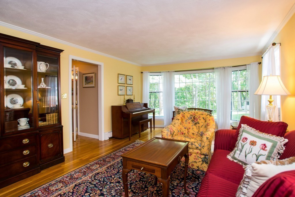 21 Lee Road Medfield, MA 02052 - Photo 10 of 30 a living room with furniture and a window
