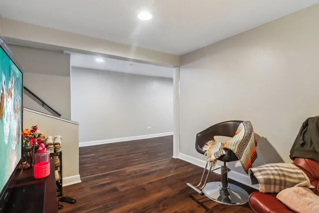 a view of entryway with wooden floor