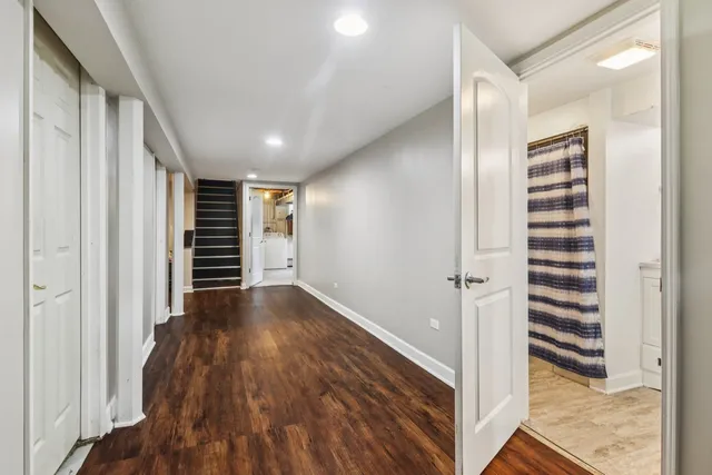 a view of entryway with wooden floor