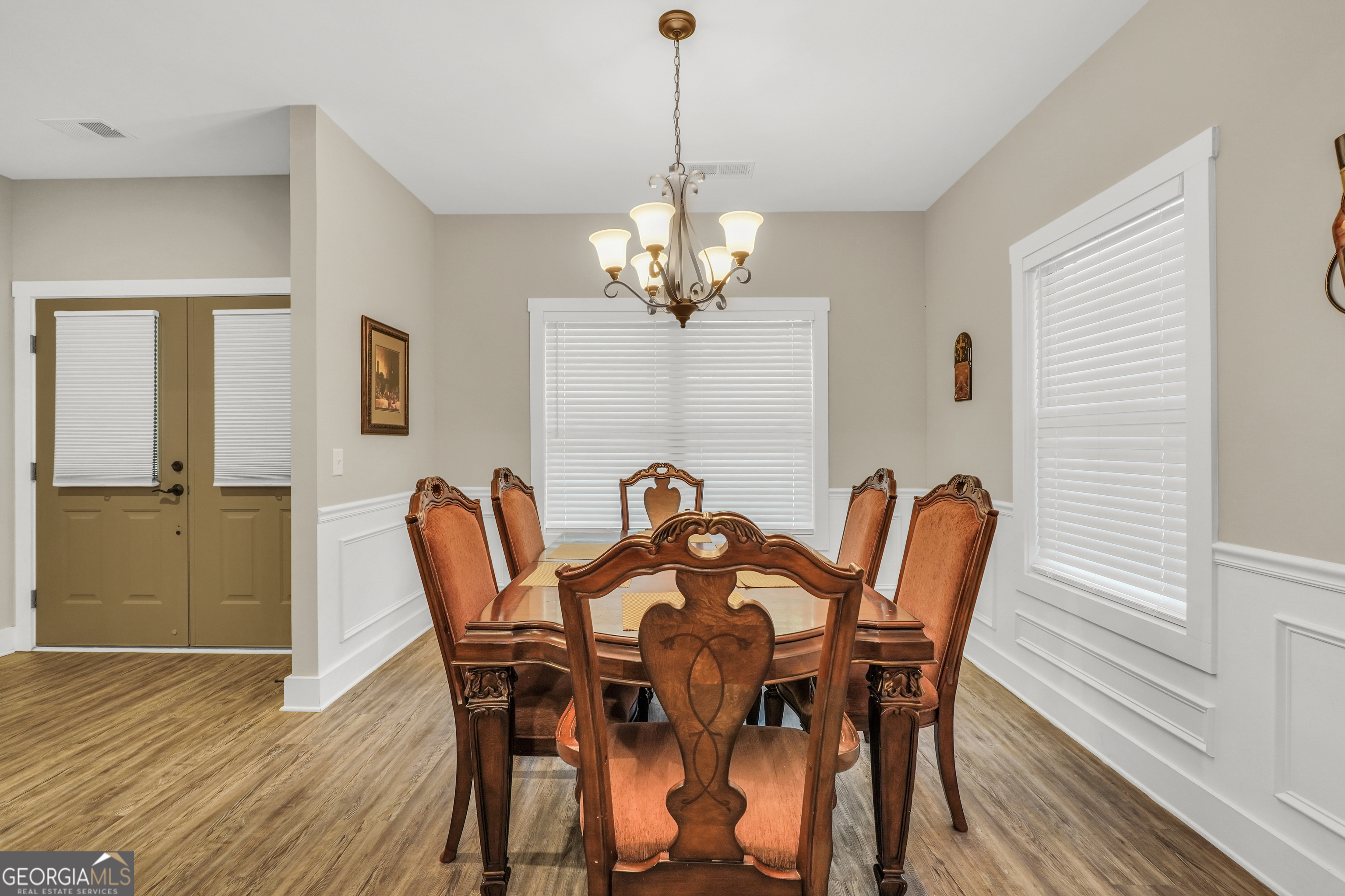 2985 Teamon Road Griffin, GA 30223 - Photo 20 of 50 a view of a dining room with furniture and wooden floor