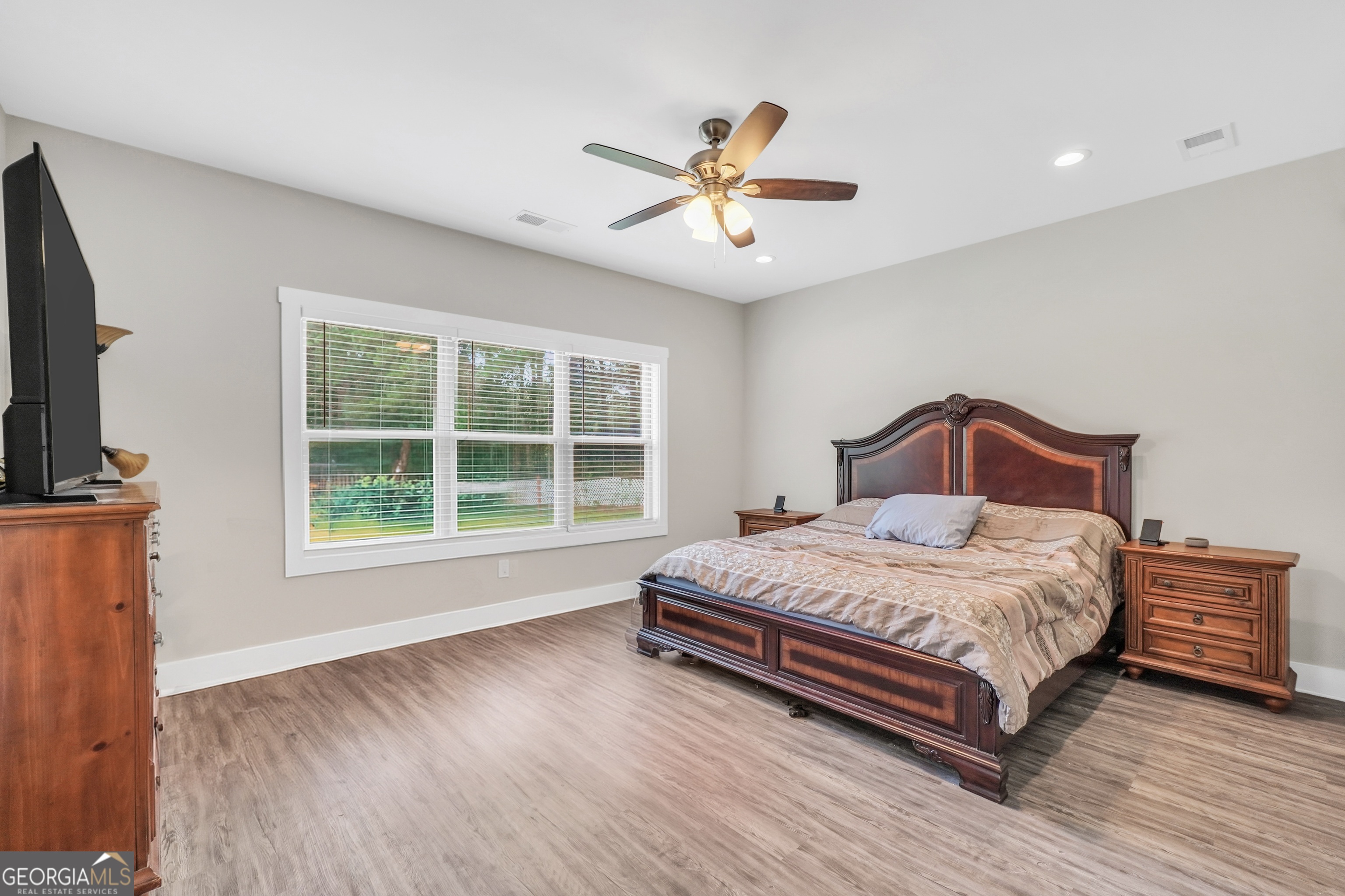 2985 Teamon Road Griffin, GA 30223 - Photo 22 of 50 a bedroom with a bed and a window