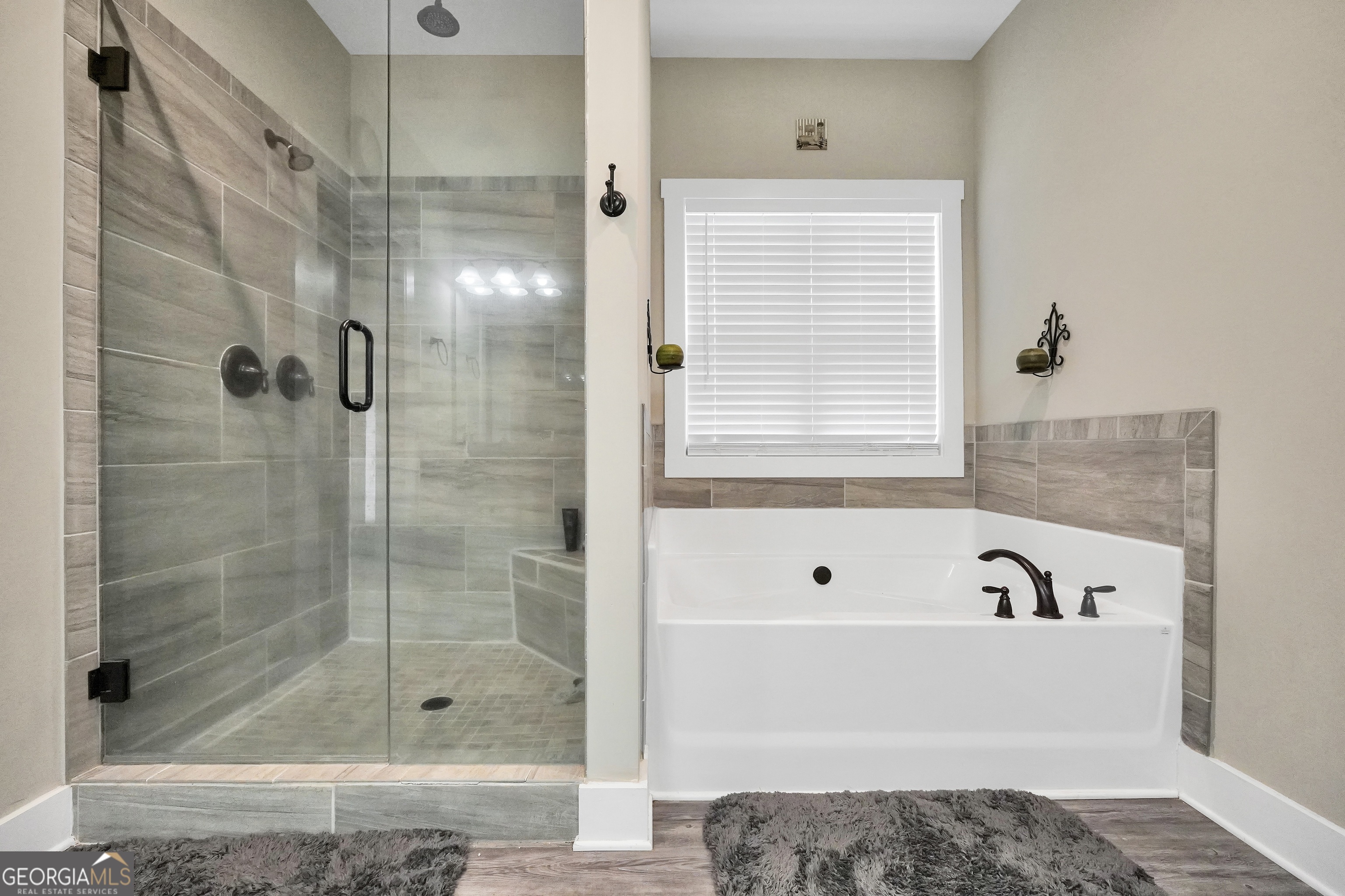 2985 Teamon Road Griffin, GA 30223 - Photo 24 of 50 a bathroom with a bathtub and shower