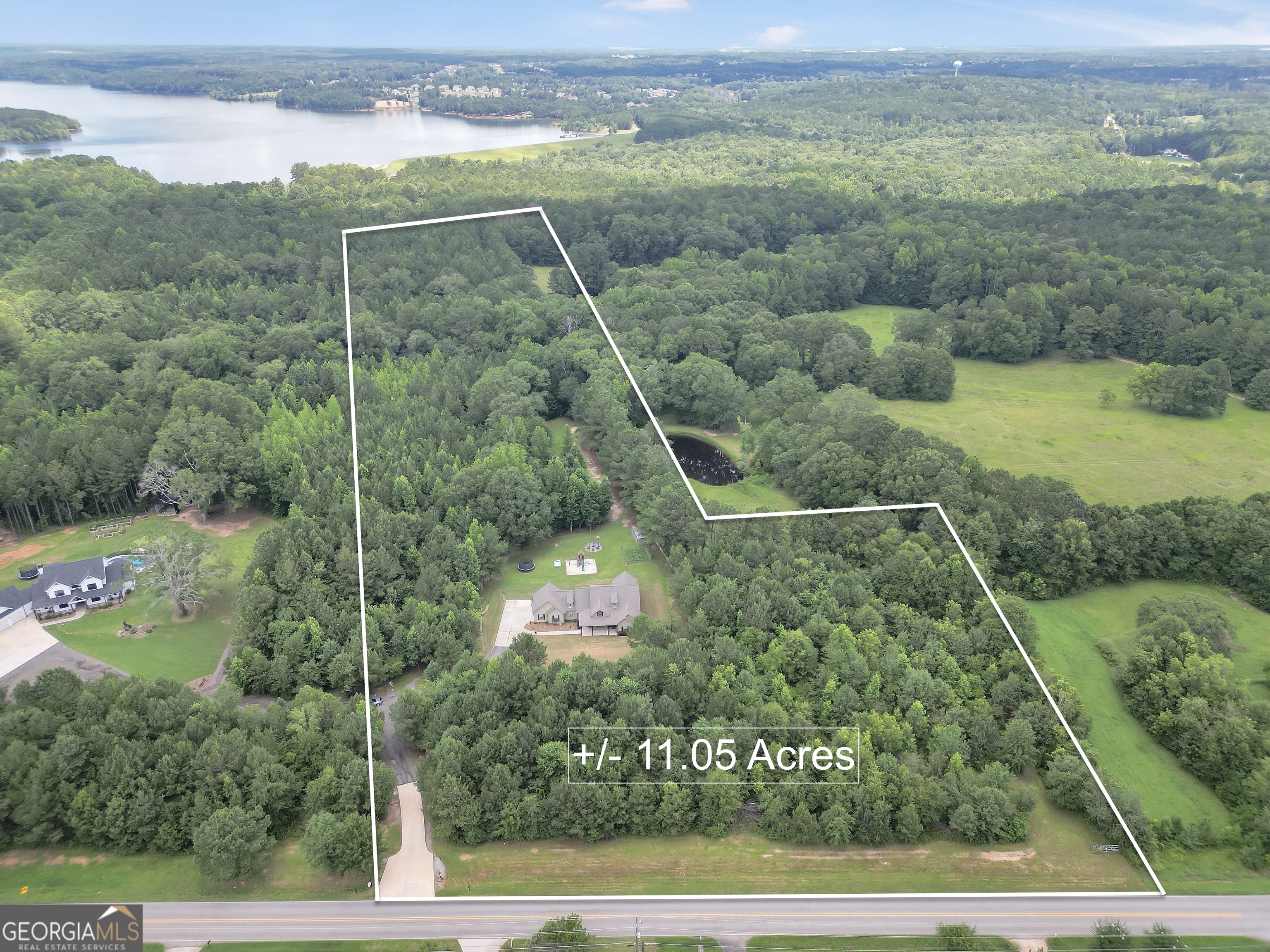 2985 Teamon Road Griffin, GA 30223 - Photo 4 of 50 an aerial view of a houses with a yard