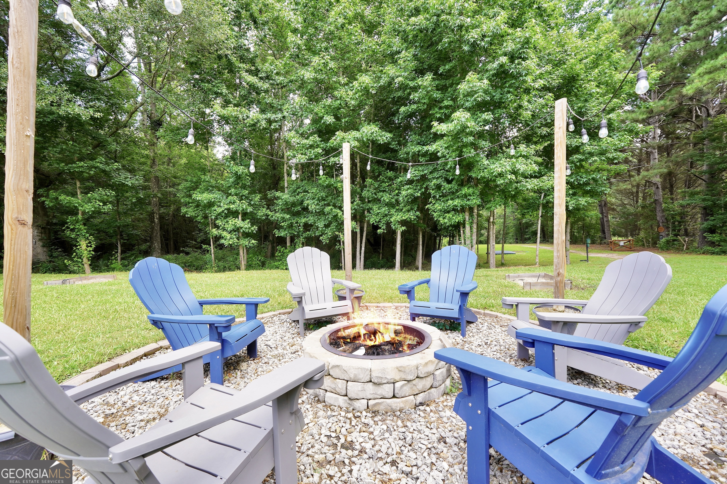 2985 Teamon Road Griffin, GA 30223 - Photo 46 of 50 a view of a table and chairs in the patio