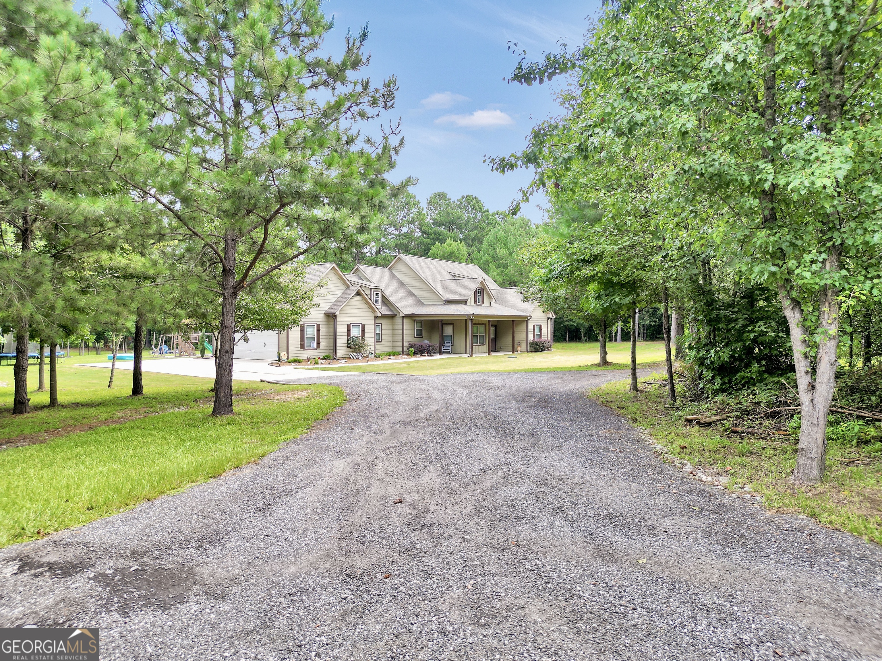 2985 Teamon Road Griffin, GA 30223 - Photo 7 of 50 a front view of a house with a yard