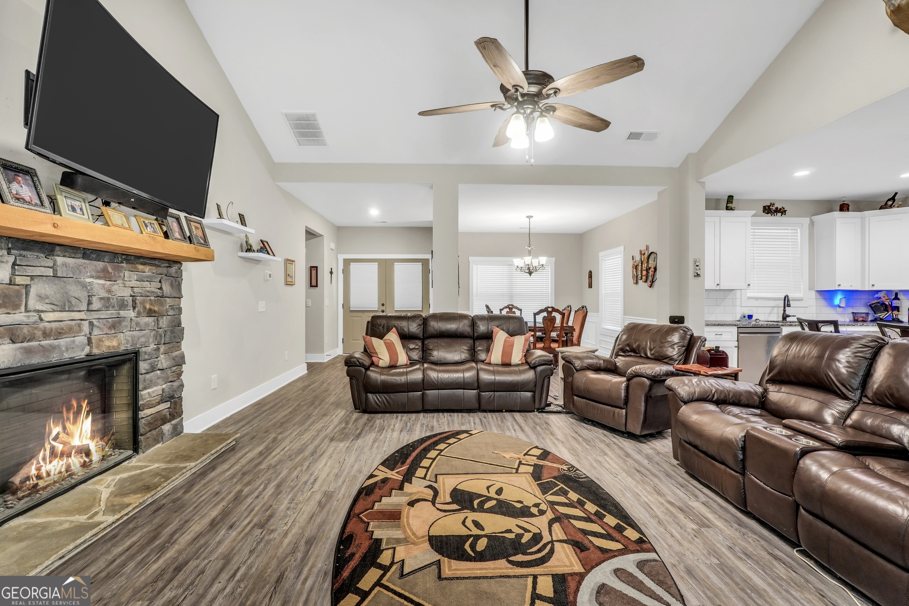 2985 Teamon Road Griffin, GA 30223 - Photo 9 of 50 a living room with furniture and a fireplace