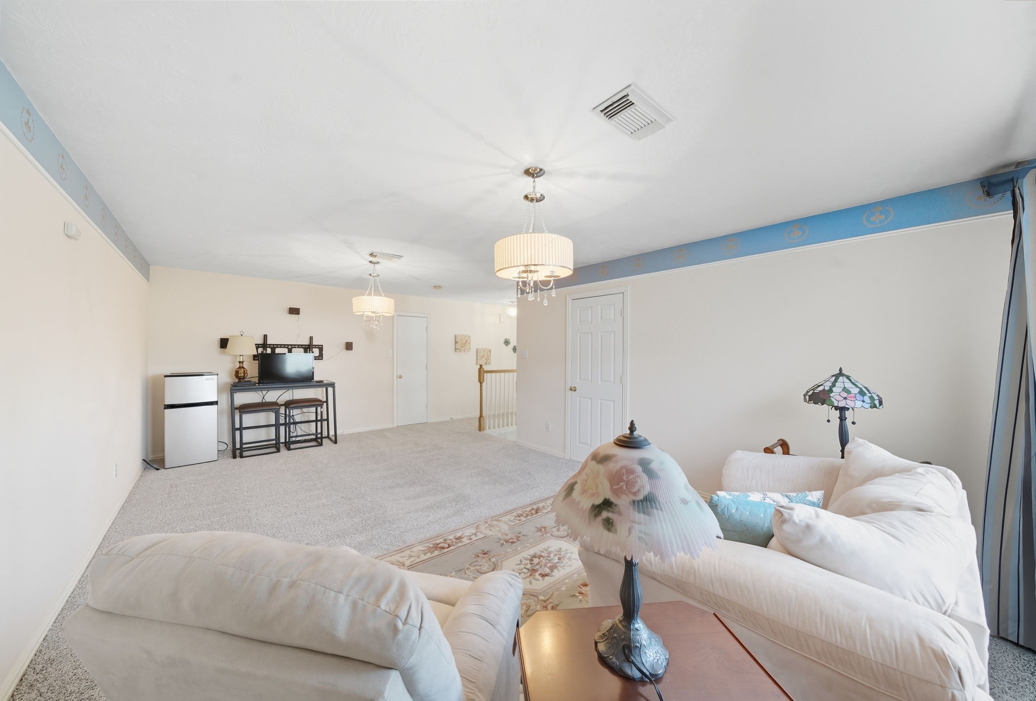 2302 Palm Circle Seabrook, TX 77586 - Photo 23 of 35 a living room with furniture and kitchen view
