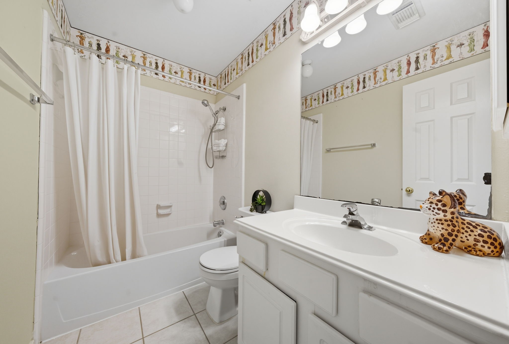 2302 Palm Circle Seabrook, TX 77586 - Photo 28 of 35 a bathroom with a sink a toilet and shower