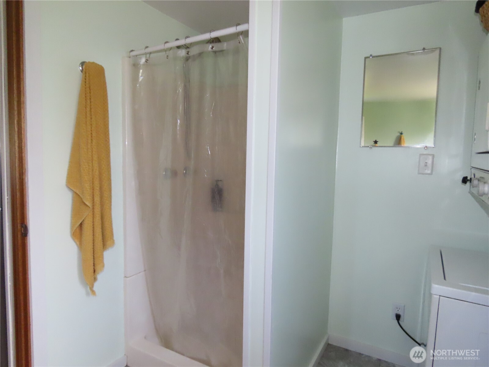 845 Schmid Road Grayland, WA 98547 - Photo 15 of 34 a bathroom with a shower and a sink