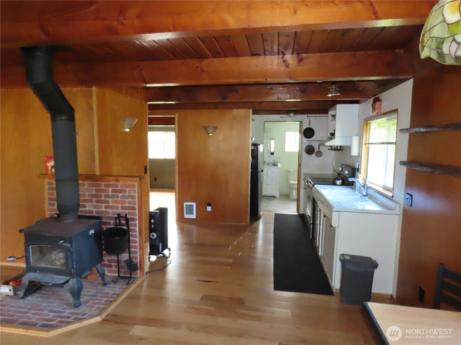 845 Schmid Road Grayland, WA 98547 - Photo 24 of 34 a dining room with furniture and wooden floor