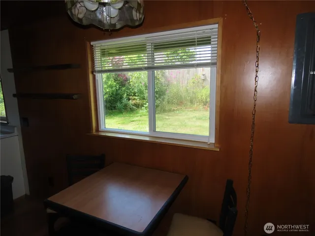 a view of a room that has a window in it