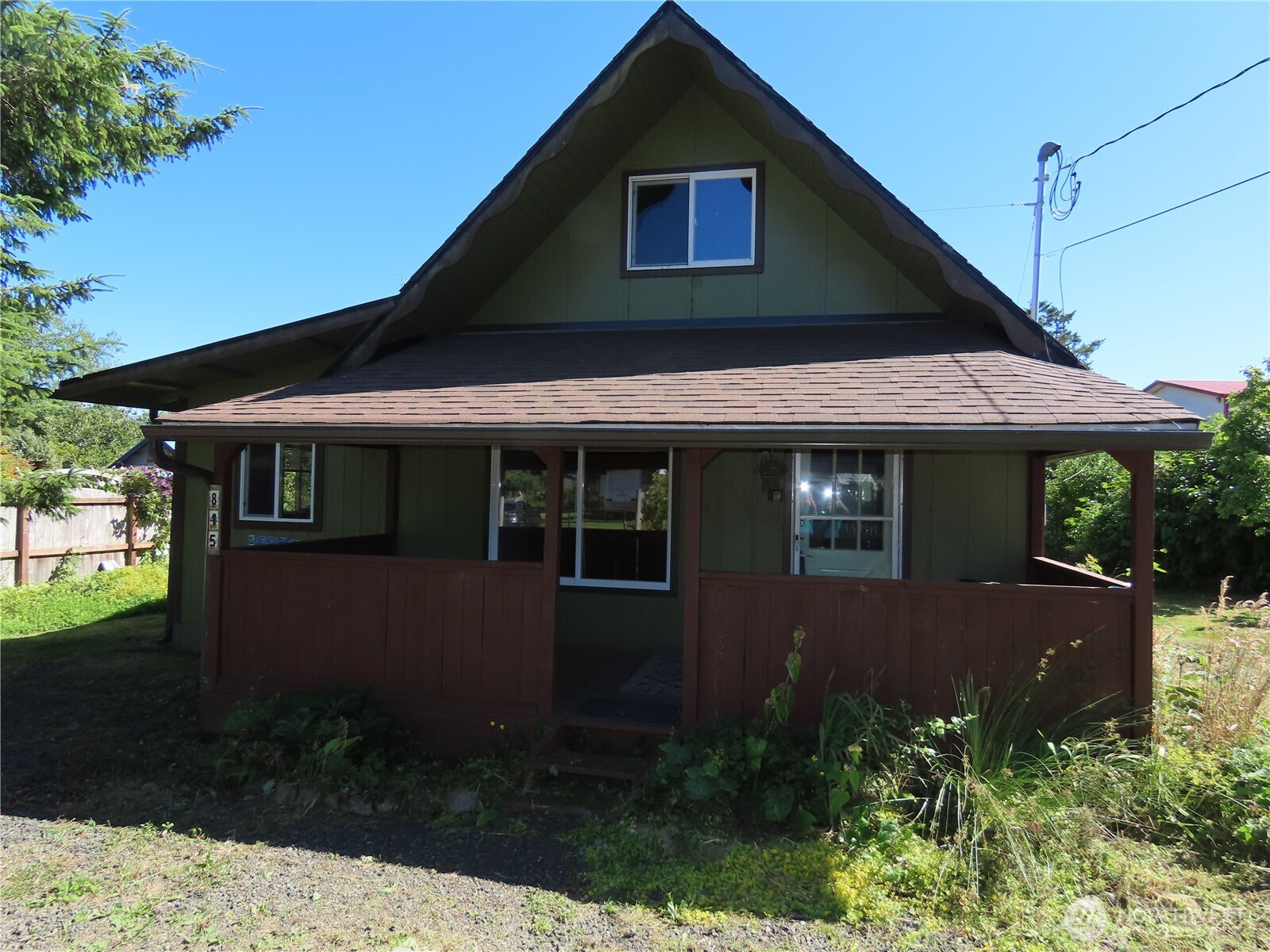 845 Schmid Road Grayland, WA 98547 - Photo 26 of 34 a front view of a house with garden