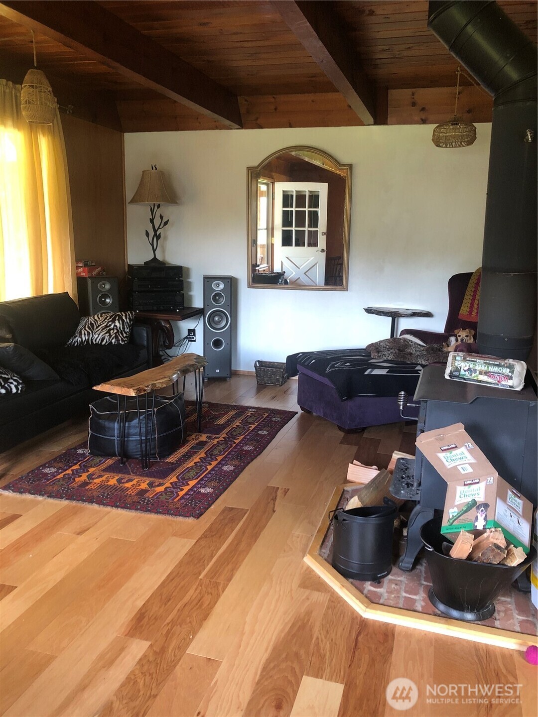845 Schmid Road Grayland, WA 98547 - Photo 28 of 34 a living room with furniture and a fireplace
