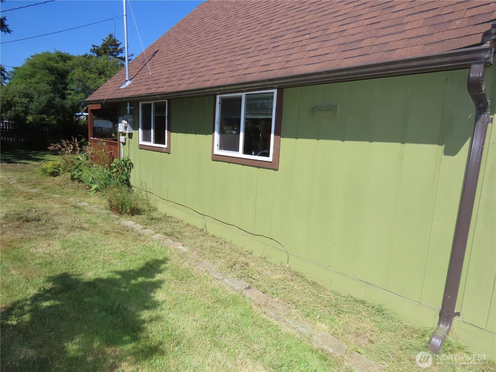 845 Schmid Road Grayland, WA 98547 - Photo 5 of 34 a front view of a house with garden