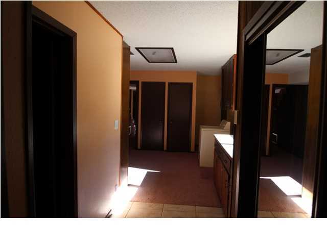 1500 Preservation Path Baker, FL 32531 - Photo 14 of 20 a bathroom with a sink and a mirror