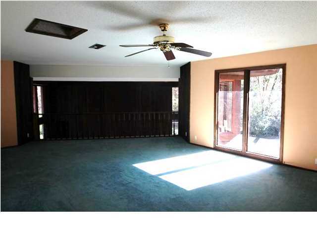 1500 Preservation Path Baker, FL 32531 - Photo 15 of 20 a living room with furniture and a fireplace