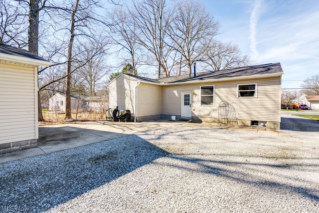 151 Meadowridge Road Mogadore, OH 44260 - Photo 21 of 26 Back of house with a patio